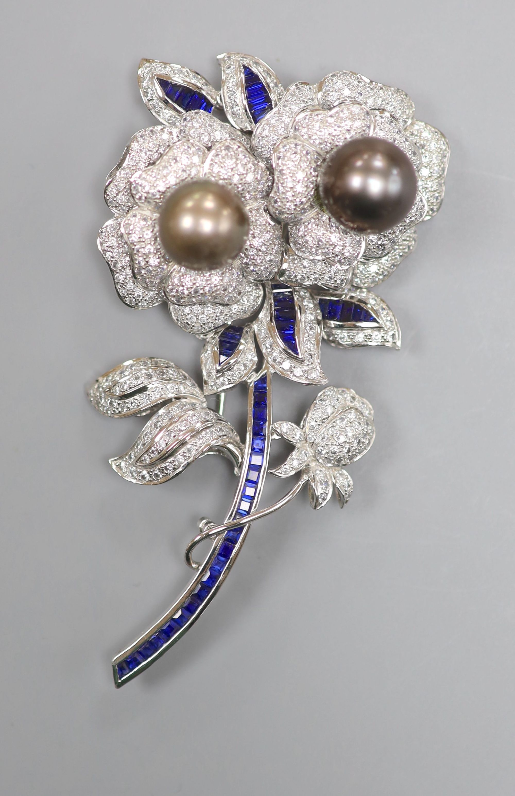 An ornate tahitian pearl and two colour paste? set costume floral spray clip brooch, 84mm.